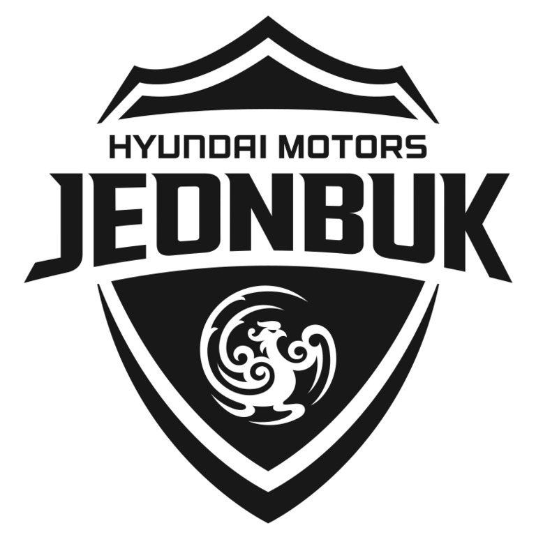 방패 형태의 엠블럼 안에 'HYUNDAI MOTORS JEONBUK'이라는 글자가 있고, 아래에는 용 모양 문양이 있는 흑백 로고 이미지.